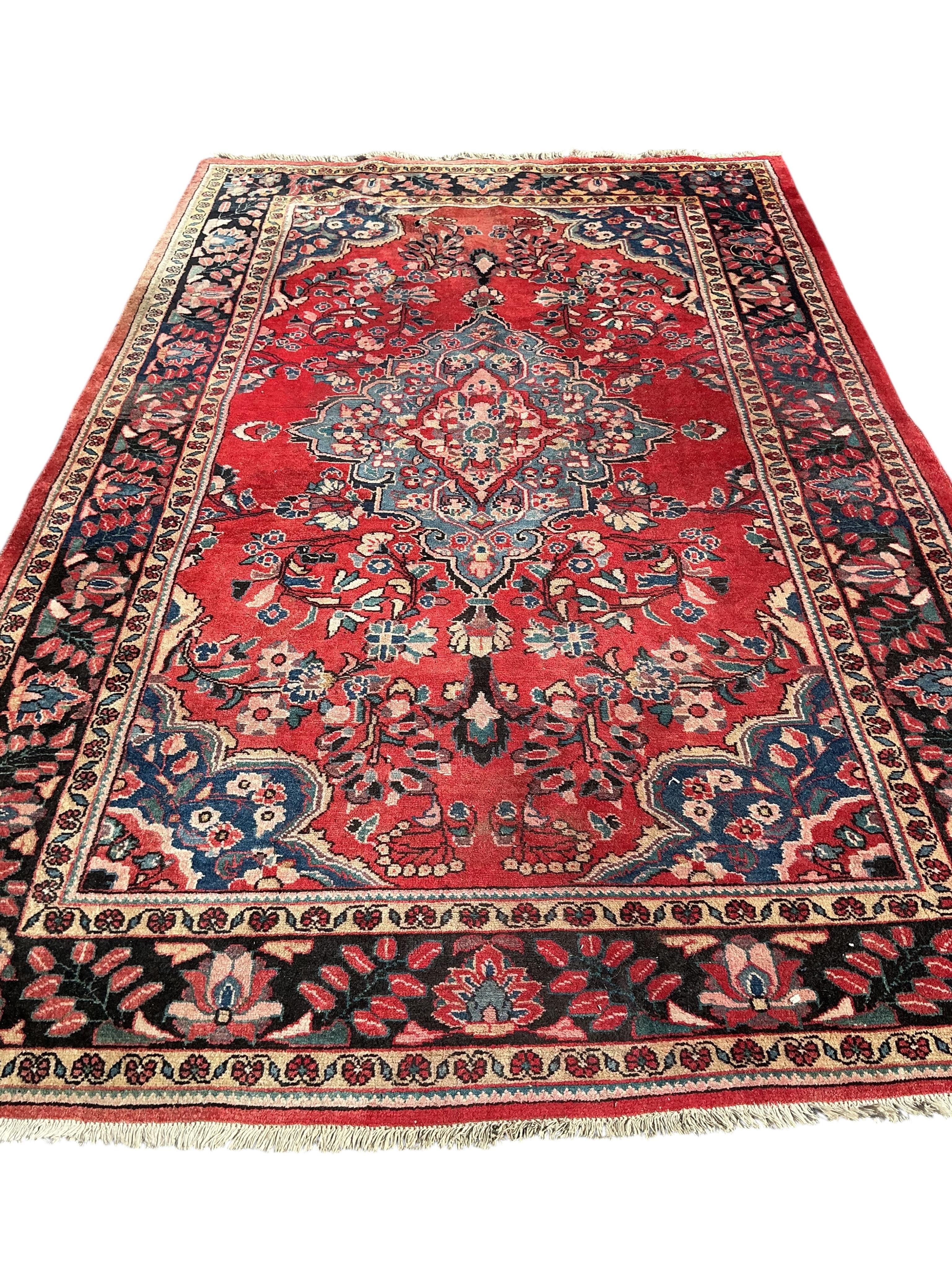 A Tabriz carpet, 310 x 200cm